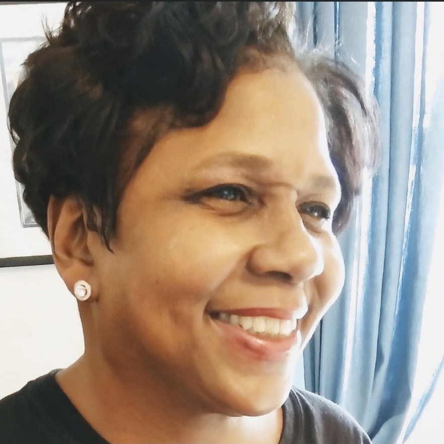 Short tapered cut with a color touch-up and rinse with highlights