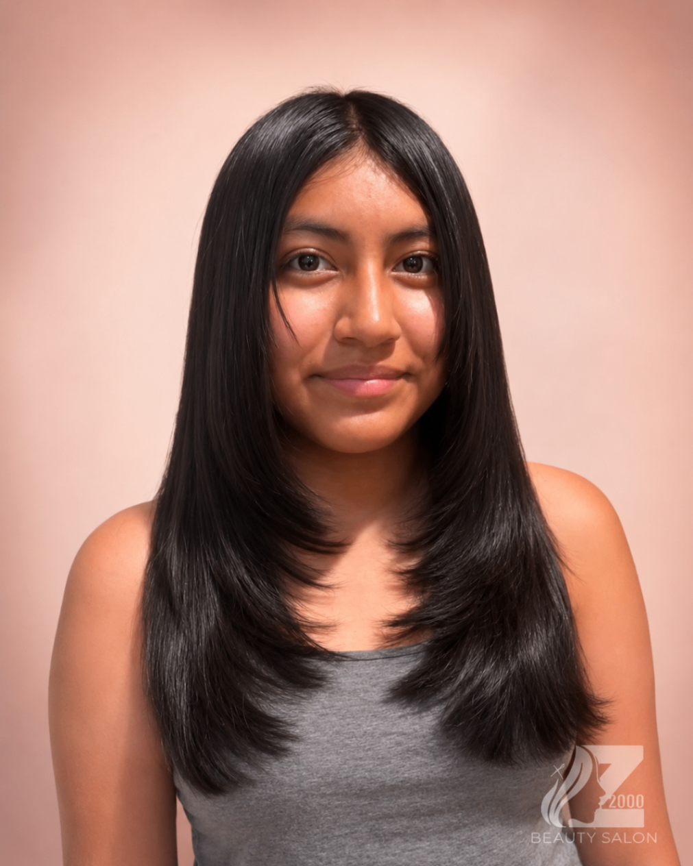 Long layered cut with sleek black finish styled at Z2000 Beauty Salon